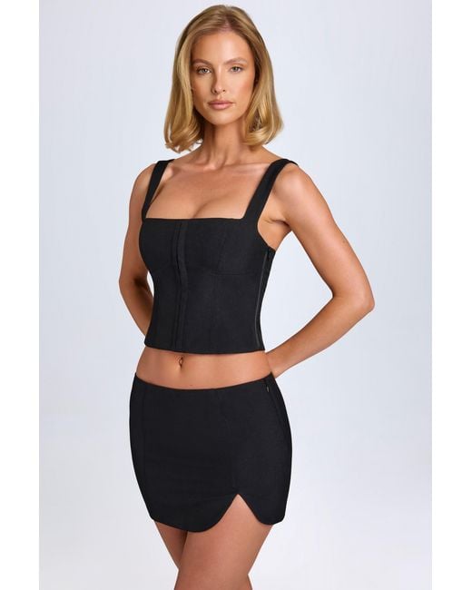 Oh Polly Black Curved Low-Rise Mini Skirt
