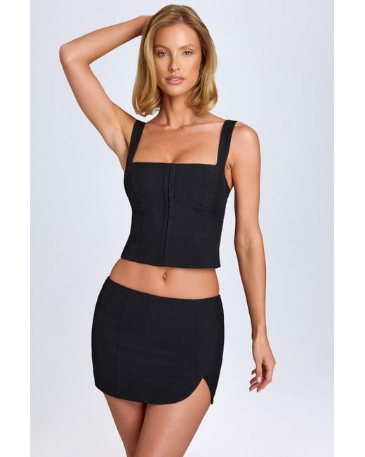 Oh Polly Black Curved Low-Rise Mini Skirt