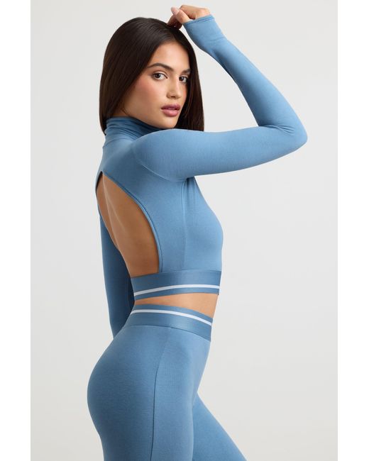 BO+TEE Blue Backless Turtleneck Long-Sleeve Crop Top