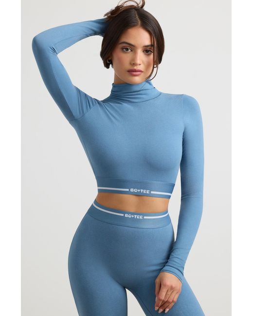 BO+TEE Blue Backless Turtleneck Long-Sleeve Crop Top