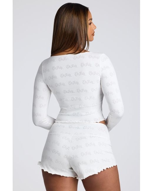 Oh Polly White Mid Rise Pointelle Mini Shorts