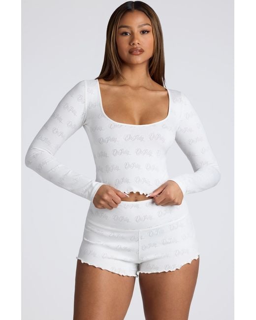 Oh Polly White Mid Rise Pointelle Mini Shorts
