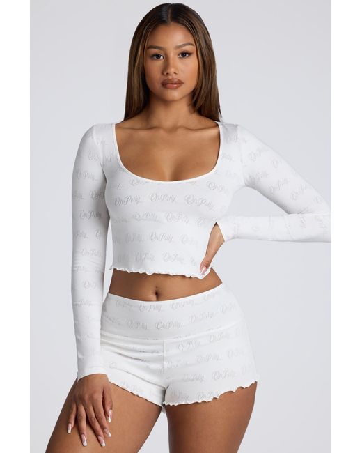 Oh Polly White Mid Rise Pointelle Mini Shorts