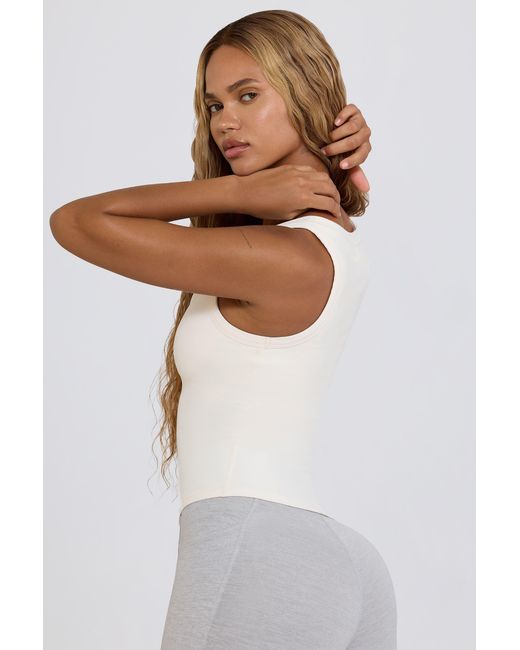 BO+TEE White Soft Active V-Neck Tank Top