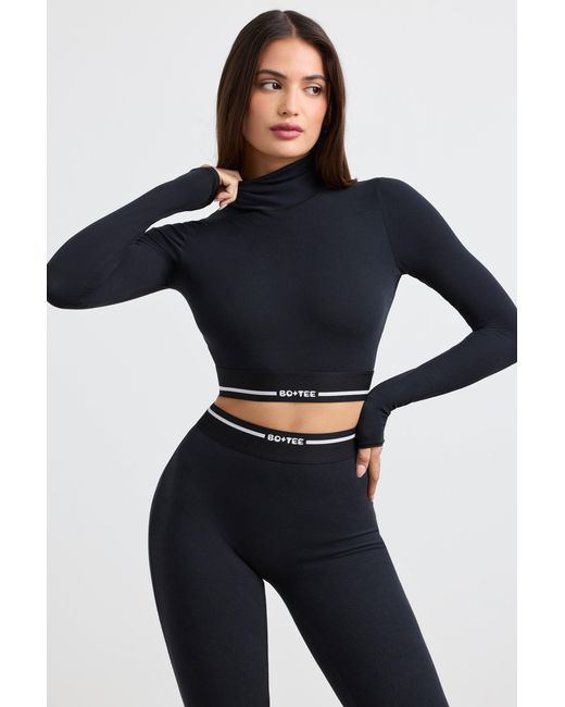 BO+TEE Black Backless Turtleneck Long-Sleeve Crop Top