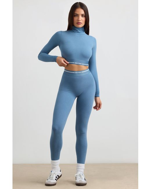 BO+TEE Blue Backless Turtleneck Long-Sleeve Crop Top