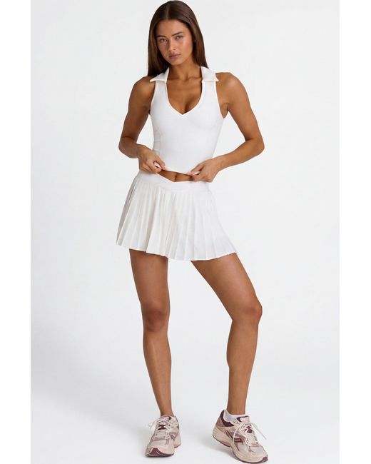 BO+TEE White Soft Active Crossover Pleated Mini Skort