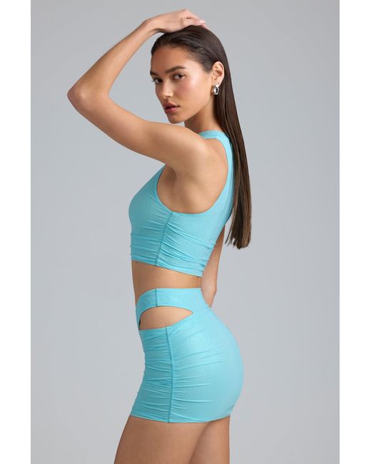Oh Polly Blue Metallic Cut-Out Low-Rise Mini Skirt