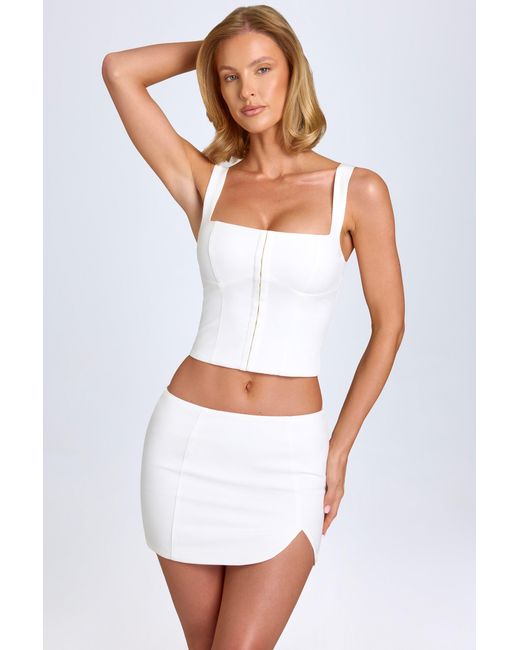 Oh Polly White Curved Low-Rise Mini Skirt