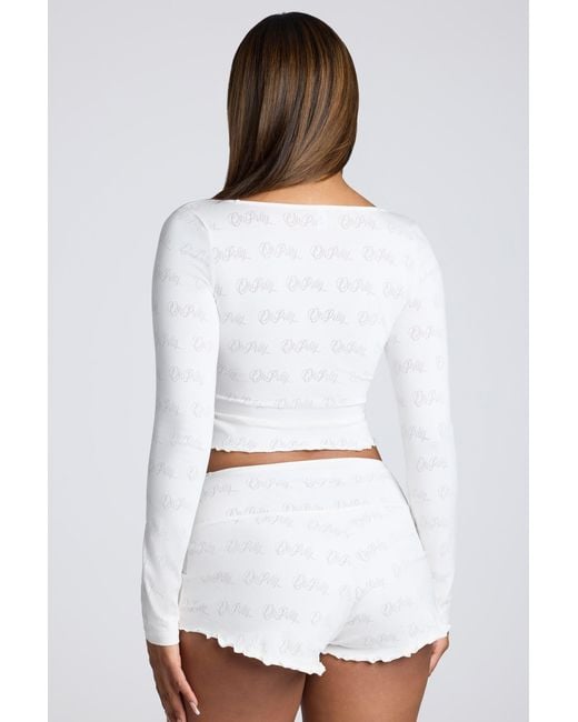 Oh Polly White Mid Rise Pointelle Mini Shorts