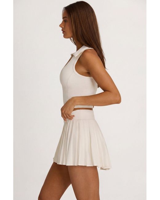 BO+TEE White Soft Active Crossover Pleated Mini Skort