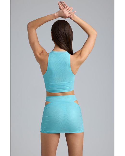 Oh Polly Blue Metallic Cut-Out Low-Rise Mini Skirt