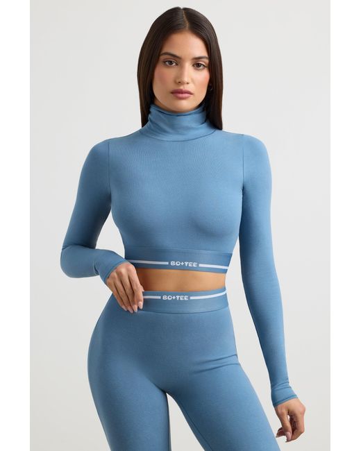 BO+TEE Blue Backless Turtleneck Long-Sleeve Crop Top