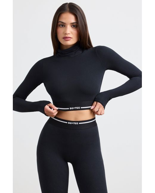 BO+TEE Black Backless Turtleneck Long-Sleeve Crop Top
