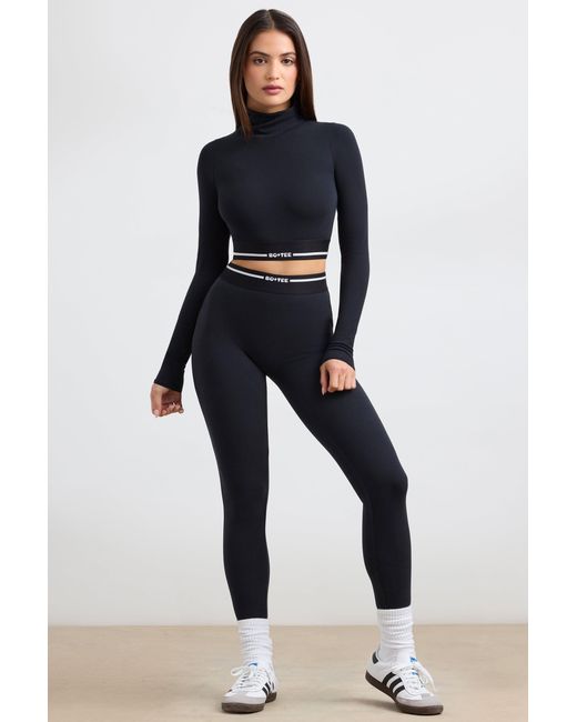 BO+TEE Black Backless Turtleneck Long-Sleeve Crop Top