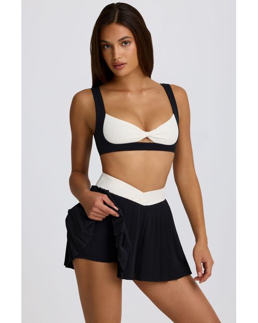 BO+TEE Black Soft Active Crossover Pleated Mini Skort