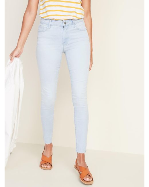 mid rise raw edge rockstar jeans
