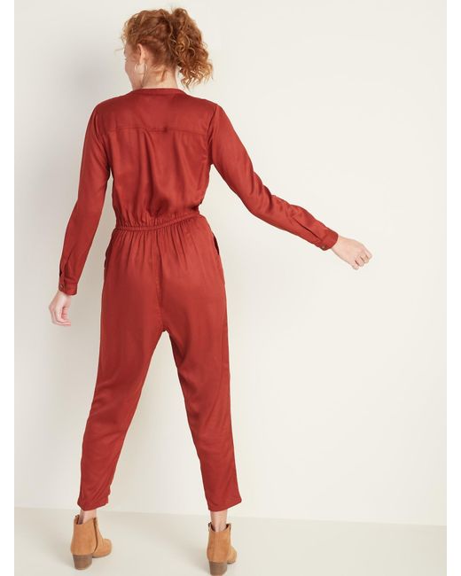 red utility jumpsuit
