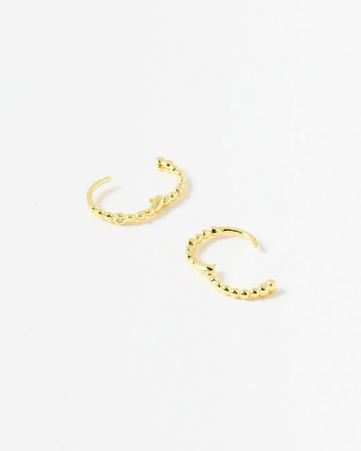 Oliver Bonas Metallic Yara Ball Huggie Earrings