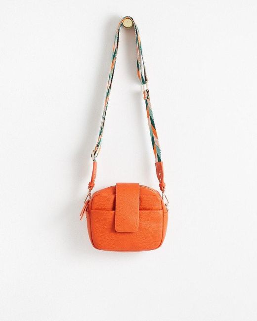Oliver Bonas Emilia Chevron Print Strap Crossbody Camera Bag in Orange