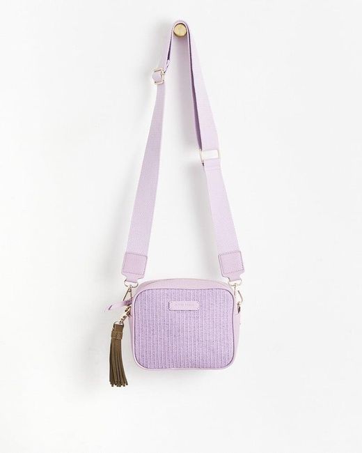 Oliver Bonas Bonnie Lilac Weave Tassel Crossbody Camera Bag in Pink | Lyst
