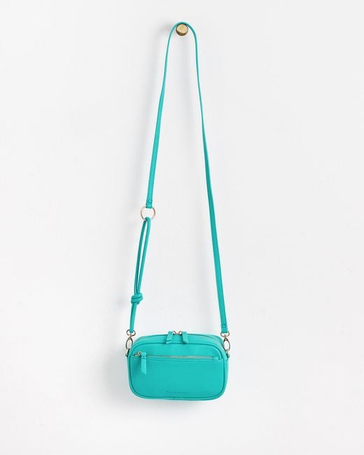 Oliver Bonas Sabina Turquoise Mini Camera Crossbody Bag in Blue | Lyst UK