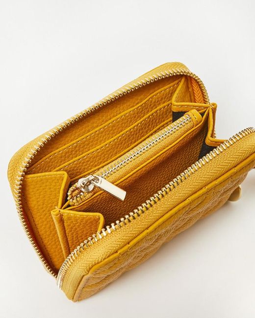 Oliver Bonas Wavy Stitch Ochre Zipped Wallet in Yellow Lyst