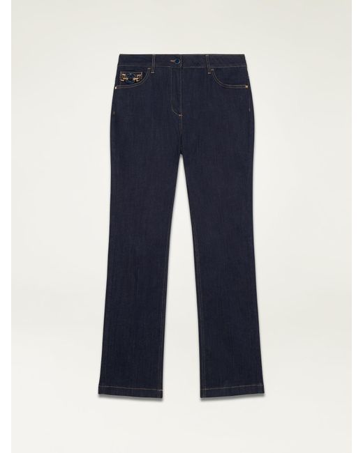 Jeans regular rinse con fibbia di Oltre in Blue