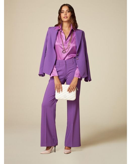 Pantaloni a palazzo in tessuto tecnico stretch di Oltre in Purple