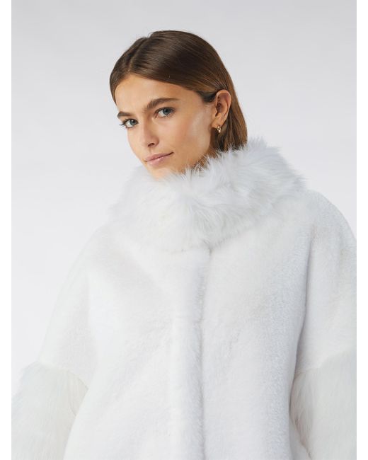 Cappotto in pelliccia sintetica di Oltre in Bianco | Lyst