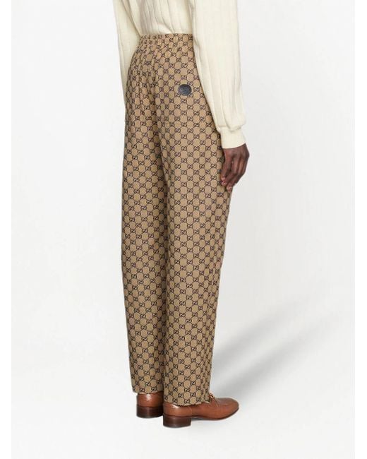 Gucci Brown Monogram-print Drawstring Trousers for men