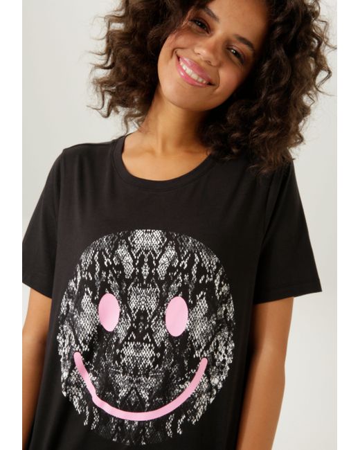 Aniston CASUAL Black T-Shirt mit Smiley-Frontprint im Animal-Look