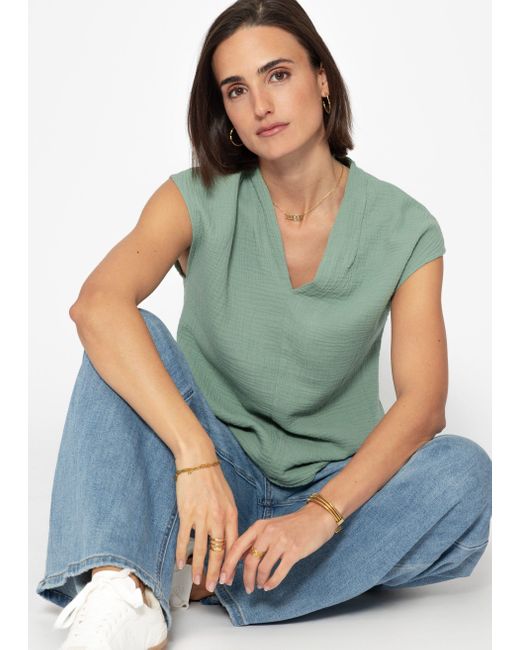 SassyClassy Green Kurzarmshirt Musselin Shirt kurz mit V-Ausschnitt Elegant Lockere ärmellose Top
