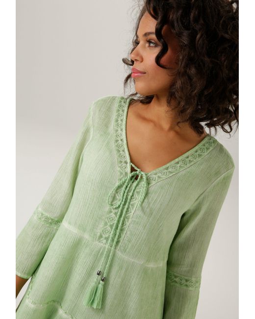Jersey-Unterkleid) ( Lyst Aniston DE Tunikakleid Grün aufwändiger in mit CASUAL | Spitzenverzierung