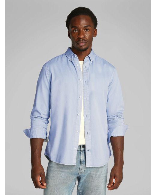 Calvin Klein Langarmhemd GARMENT DYED LW TWILL L/S SHIRT mit Logostickerei in Blue für Herren