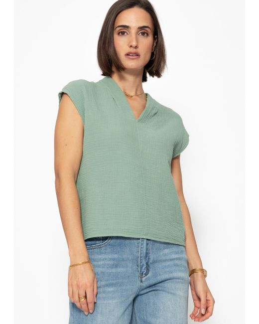 SassyClassy Green Kurzarmshirt Musselin Shirt kurz mit V-Ausschnitt Elegant Lockere ärmellose Top