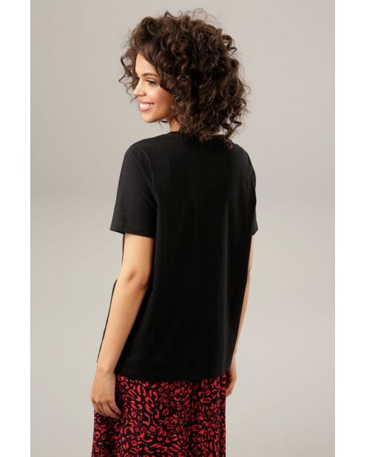 Aniston CASUAL Black T-Shirt mit kunstvollem Kopf aus Kordel und Stickerei