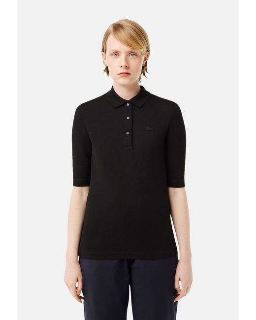 Lacoste Black Poloshirt Slim Fit Polo-Shirt aus Baumwolle mit (1-tlg)