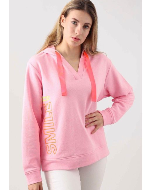 Zwillingsherz Pink Sweatshirt mit V-Ausschnitt, Frontprint durch das Wort Smile, neonfarben