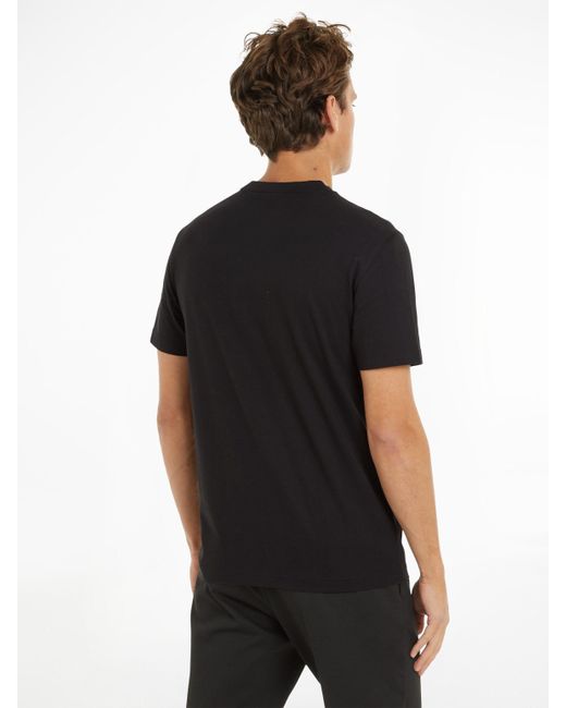 Calvin Klein BRUSH LOGO T-SHIRT mit Logoschriftzug in Black für Herren