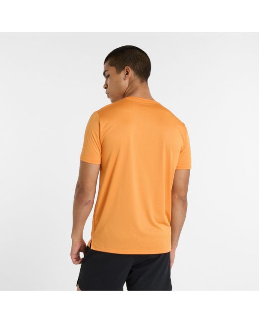 New Balance Laufshirt Sport Essentials T-Shirt mit Streifendesign in Orange für Herren