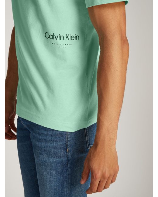 Calvin Klein OFF PLACEMENT LOGO T-SHIRT mit Logoschriftzug in Green für Herren