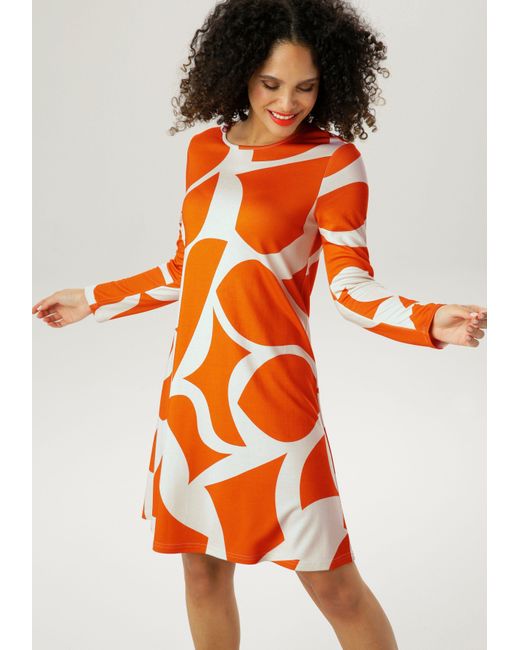 Aniston SELECTED Jerseykleid mit Allover-Muster in Orange | Lyst DE | Jerseykleider
