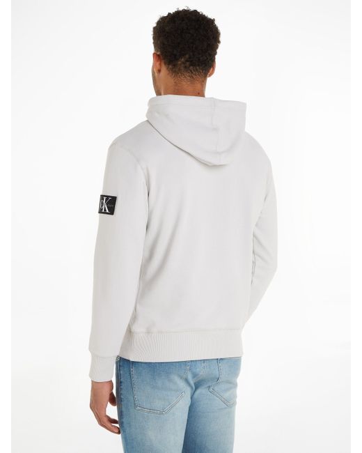 Calvin Klein Kapuzensweatshirt BADGE HOODIE mit Logopatch in White für Herren