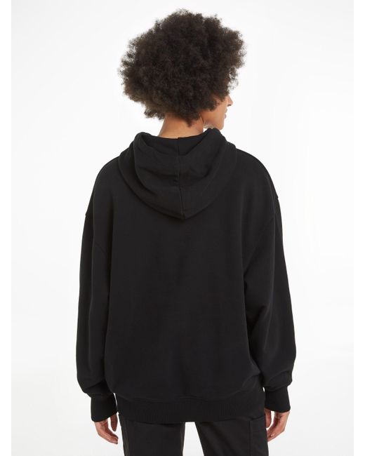 Calvin Klein Black Longsweatshirt WOVEN LABEL OVERSIZED HOODIE mit Logopatch