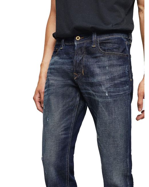 DIESEL Fit- Larkee-Beex 087AT Jeans Hose Regular Tapered in Blue für Herren
