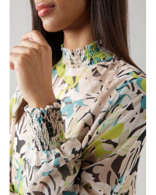 Aniston SELECTED Chiffonbluse mit Blätterdruck und Smokbündchen in Grau |  Lyst DE