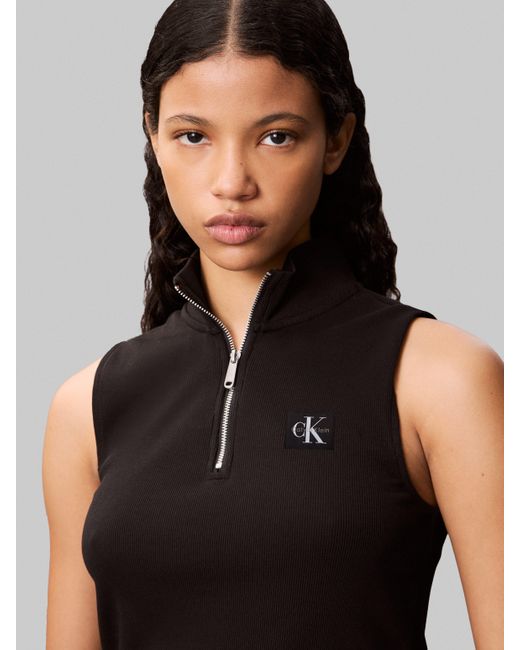 Calvin Klein Black Tanktop A- WOVEN LABEL SL QZ TOP Mit Rundhalsausschnitt