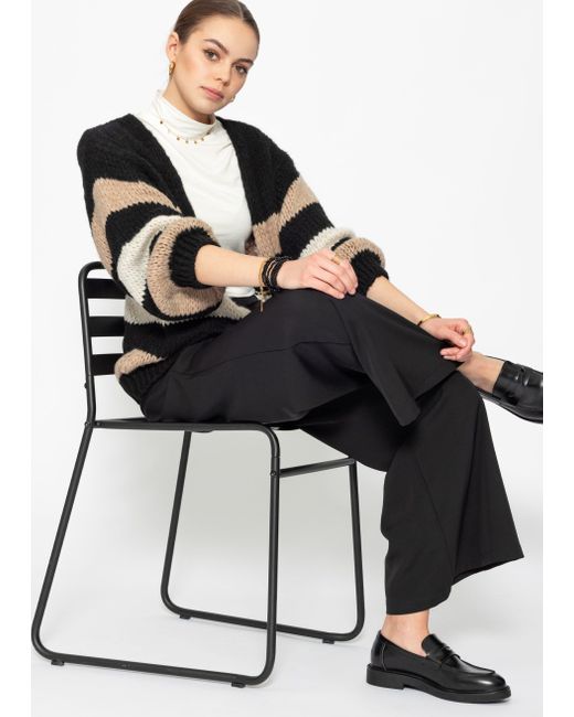 SassyClassy Black Offen fallender Cardigan gestreift aus weichem Strick mit Ballonärmel