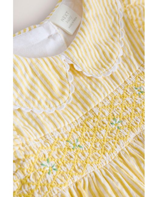 Next Yellow Smokkleid Besticktes Kleid aus 100 % Baumwolle (1-tlg)